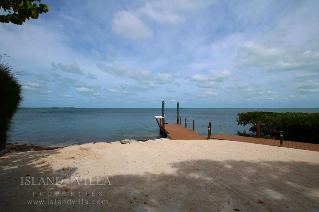 boat dock and beach area overlooking florida bay