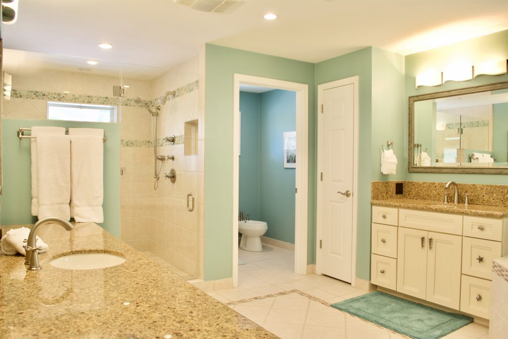 large master bathroom with his and hers sinks