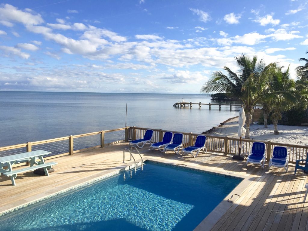 waterfront pool deck over looking the Atlantic ocean and alligator reef lighthouse